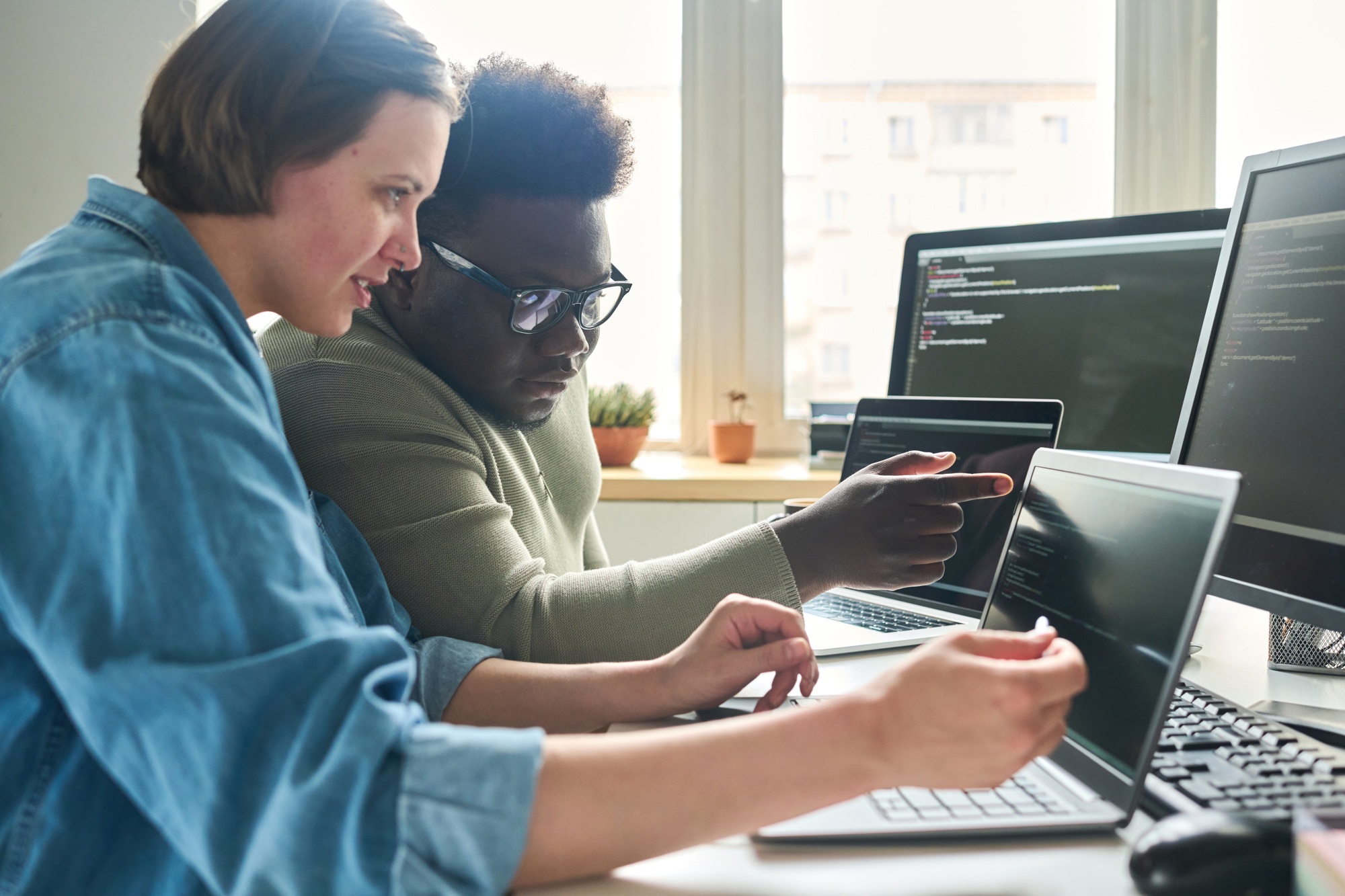 programmers-working-with-new-software-in-team-1.jpg